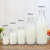 Atacado e varejo spot garrafa de pudim alta 100ml garrafa com bico de pressão 200ml garrafa para embalagem de leite 500ml