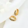 Aretes de aro chapados en oro de 14K con acabado de esmalte, clips para orejas de lujo de nicho sin perforar, venta al por mayor directa del fabricante