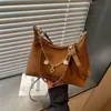 Bolsa Feminina 2026 Chegada Nova de Verão Versátil para o Dia a Dia Casual Textura Bolsa de Ombro Único Tendência Estilosa para o Trabalho Cor Sólida