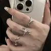 Conjunto de anillos de diseño de estrella incrustado de diamantes de nicho de joyería europea y americana transfronterizo, anillo apilable multijunta de estilo creativo personalizado
