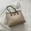 Outono de 2026 Nova Bolsa Tote Casual Elegante para o Trabalho Texturizada Simples Estilo Coreano Bolsa de Ombro Bolsa de Braço