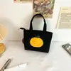 Bestseller transfronterizo: bolsa de lona estampada simple, bolso de mano pequeño cuadrado versátil y lindo para ir al trabajo
