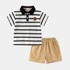 Ropa para niños ropa de verano para niños traje 2025 nuevo versión coreana de marca de moda de verano para niños POLO manga corta ropa para niños al por mayor