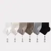Calcetines hidratantes de silicona anti-agrietamiento con alta elasticidad, ajuste holgado, talón tridimensional, antideslizantes, duraderos, cómodos, estilo juvenil, calcetines de media pantorrilla