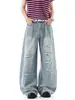 Jeans rotos lavados estilo americano para hombres y mujeres, estilo high street de otoño e invierno, pantalones curvos geniales y elegantes, pantalones de pierna ancha con vibra vintage