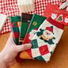 Calcetines para niñas otoño e invierno lindos de dibujos animados calcetines de media caña para mujer ins calcetines navideños modernos europeos y americanos calcetines rojos calcetines navideños