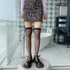 Medias de seda de hilo de núcleo ultra finas transparentes hasta la rodilla para primavera y verano estilo académico lindo negro de seda INS calcetines altos para muslos de ola de amor