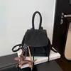 Mochila feminina versátil retrô transfronteiriça 2026 nova mochila versátil para o dia a dia com um pequeno fichário de estilo coreano refinado