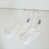 Calcetines blancos nuevos de otoño e invierno con tacón y letras, calcetines deportivos de tubo largo, calcetines negros de línea gruesa para hombre, calcetines de tubo medio de moda de algodón