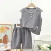 Nuevo conjunto de chaleco para niños conjunto de dos piezas de manga corta para bebé verano gofrado para niños moda Traje para niños moda fabricantes