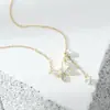 Cadena Elegante para Clavícula con Zirconia Bañada en Oro Real Diseño de Nicho Femenino Collar con Borla de Mariposa y Concha Cadena para el Cuello Versátil