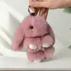 Venta al por mayor de fábrica imitación de pelo de conejo rex colgante de conejo de peluche fingiendo estar muerto lindo conejo MengMeng bolso de peluche accesorios para teléfono móvil coche llavero