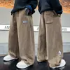 Pantalones de pana de pierna ancha para niño 2026 Nuevo estilo Primavera/Otoño Niños de talla mediana a grande Pantalones casuales holgados Estilo coreano Pantalones largos modernos Otoño