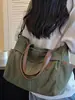 Bolsa de Lona Casual de Gran Capacidad para Viaje 2026 Nueva Llegada Otoño Bolsa de Equipaje de Alto Valor Personalidad Bolso de Hombro Cruzado de Moda