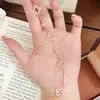 Pulseira Clássica Popular Xiaohongshu de Trevo de Quatro Folhas Vazado com Pedras Completas para Mulheres, Joia Estilo Vintage, Pulseira de Moda de Nicho de Luxo Leve