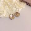 Pendientes geométricos de flor irregular de aguja de plata encantadores dorados y plateados pendientes de moda de lujo ligero pendientes personalizados de alta gama para mujer