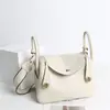 Capa Superior Piel de Vaca Togo Lindy Bolso de Piel Genuina para Mujer 2025 Nuevo Retro Europeo y Americano Bolso Cubo Moda Mano Bolso de Piel Genuina para Mujer