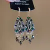 Pendientes de gota con incrustaciones de diamantes transfronterizos europeos y americanos, pendientes de lujo de alta gama, accesorios para orejas de moda de nicho, venta al por mayor desde fabricante de Yiwu
