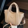 Retrô 2025 Novo Estilo Simples e Fashionável Bolsa Balde Portátil Bolsa Transversal Casual com Textura para Mulheres Bolsa Tote de Ombro Transfronteiriça