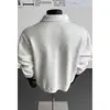 Camiseta de estilo americano de dos piezas falsas para hombre, patchwork de remaches de verano, corte holgado, talla grande, polo de manga larga con un diseño elegante y un cuello de manga corta