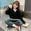 Top de punto gofre estilo coreano, imitación de dos piezas, manga larga para niñas, nuevo estilo primavera/otoño para niños medianos y grandes, versátil, elegante, capa base holgada