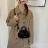 Otoño Invierno 2026 Nuevo Estilo Coreano Bolso Almohada Bolso de Hombro Único de Nicho de Mujer Moda Simple Elegante Bolso de Axila