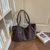 Popular bolsa de lunares de gran capacidad para mujer, nueva bolsa de hombro casual relajada 2026, bolsa de mano para estudiante universitario y para ir al trabajo