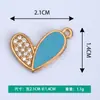 Nuevos Accesorios Creativos para Joyería DIY Corazón de Dibujos Animados Punto de Aceite Goteante Diamante Aleación Collar Pulsera Colgante Colgante Venta al por Mayor