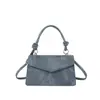 Bolso de diseño de nicho nuevo 2026, bolso cruzado moderno y texturizado, bolso versátil para mujer retro y simple, moderno