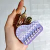Nuevo Llavero de Mini Piano Transfronterizo Dibujo Animado Lindo Tocando el Piano Sanrio Juguete Musical Colgante Pequeño
