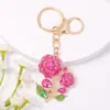 Llavero de Cristal de Rosa Creativo de Lujo Ligero Planta Flor Pedrería Llavero de Metal Yiwu Pequeños Artículos al por Mayor