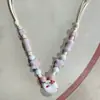 Collar con colgante de campana de mariposa de cerámica de estilo étnico retro para mujer, diseño nuevo y moderno, cadena larga para suéter, accesorios