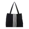 Bolso tote de lona de gran capacidad estilo casual coreano 2026 para mujer, nuevo bolso de mano de moda para estudiantes, adecuado para la escuela y el trabajo