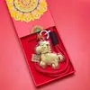 Acessórios de Chaveiro "Fique Rico Instantaneamente" em Ouro Puro 999, Série Ano Novo do Cavalo, Presentes Corporativos Populares Banhados a Ouro, Atacado