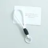 Nuevo cordón para teléfono anudado de bloques de color, llavero DIY hecho a mano, accesorio para bolso, colgante de regalo pequeño, venta al por mayor