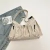 Bolsa de Ombro Versátil Plissada com Cordão e Múltiplos Bolsos Transfronteiriça Novo Modelo 2026 Cor Sólida Casual Texturizada Bolsa Transversal para Mulheres