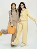 Conjunto casual de punto de color liso para mujer, nueva colección otoño/invierno 2026, con un suéter de media cremallera y pantalones de pierna ancha de cintura alta, un conjunto de dos piezas