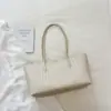 Bolsas Femininas da Moda 2026 Nova Pequena de Nicho Tecida de Ombro Único Simples Elegante Bolsa Tote Casual de Braço Tendência