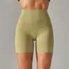 Pantalones de yoga de estilo nuevo sin línea de vergüenza color piel para mujer, cintura alta, realce de glúteos, compresión abdominal, shorts deportivos de tres puntos