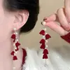 Pendientes de Fuegos Artificiales de Circonita Roja de Año Nuevo para Mujer 2026 Nuevo Estilo Popular Pendientes Únicos y Hermosos