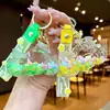 Llavero Luminoso de Motocicleta de Moda para Tiktok Figura Flotante Creativa de Acrílico Colgante de Botella de Arena Líquida Rellena de Aceite Venta al por Mayor