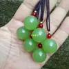 Joyería de jade al por mayor: colgantes de cuentas redondas hechos de materiales extranjeros, jade Hetian de imitación, colgantes de jade verde manzana, colgantes totalmente verdes al por mayor