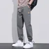 Nuevos Pantalones Harem Sueltos con Cordón, Patchwork Elástico en la Cintura, para Primavera y Otoño, de Marca Moderna, Ropa de Trabajo Deportiva Casual para Hombre