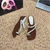 Sandálias de salto anabela com poá estilo francês para mulheres, novos sapatos de salto alto para o verão de 2026, sandálias slip-on com fivela de metal afuniladora