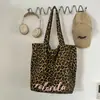 Bolso de Lona con Estampado de Leopardo Retro para Mujer 2026 Nuevo Gran Capacidad para Viajes Diarios Bolso de Compras Casual Elegante Bolso de Hombro Único