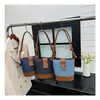 Bolso de Moda de Alta Gama para Mujer 2026 Nuevo Elegante Retro Simple Bolso Cubo Bolso Cruzado de Hombro de Nicho