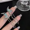 Aretes Dinámicos de Cadena con Borla de Mariposa Azul Verdoso y Circonitas para Mujer, Diseño de Nicho, Aretes de Alta Gama, Elegantes Pendientes de Clip para Orejas sin Perforar