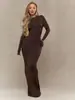 Vestido ajustado de cuello redondo y manga larga, superventas transfronterizo europeo y americano para mujer, con elástico, corte ceñido, mangas con agujero para el pulgar y bajo de sirena de color liso.