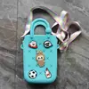 Monedero de silicona con forma de cueva cuadrada para niños, bolso cruzado para caminar, divertido y bonito bolso de silicona para cambio.