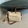 Bolsa transversal de grande capacidade de alta qualidade para outono e inverno para mulheres, novo modelo 2026, com zíper, bolsa de mão de lona cinza